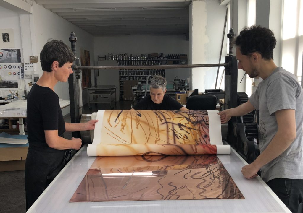 Julie Dam, Mette Ulstrup and Thomas Jennions printing Julie Mehretu's 'Slouching Towards Bethlehem' (2020) at BORCH Editions, Copenhagen